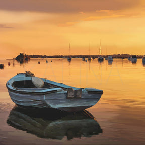 Painting of a boat on water with a sunset sky