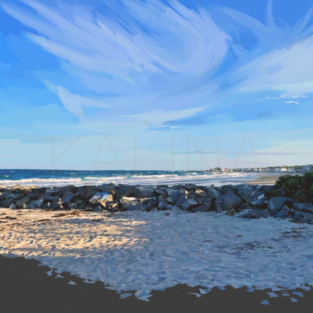 Beach scene with waves, rocks, and a clear sky
