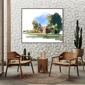 Modern outdoor patio with wooden chairs, a small table, and a framed landscape painting on a stone wall.