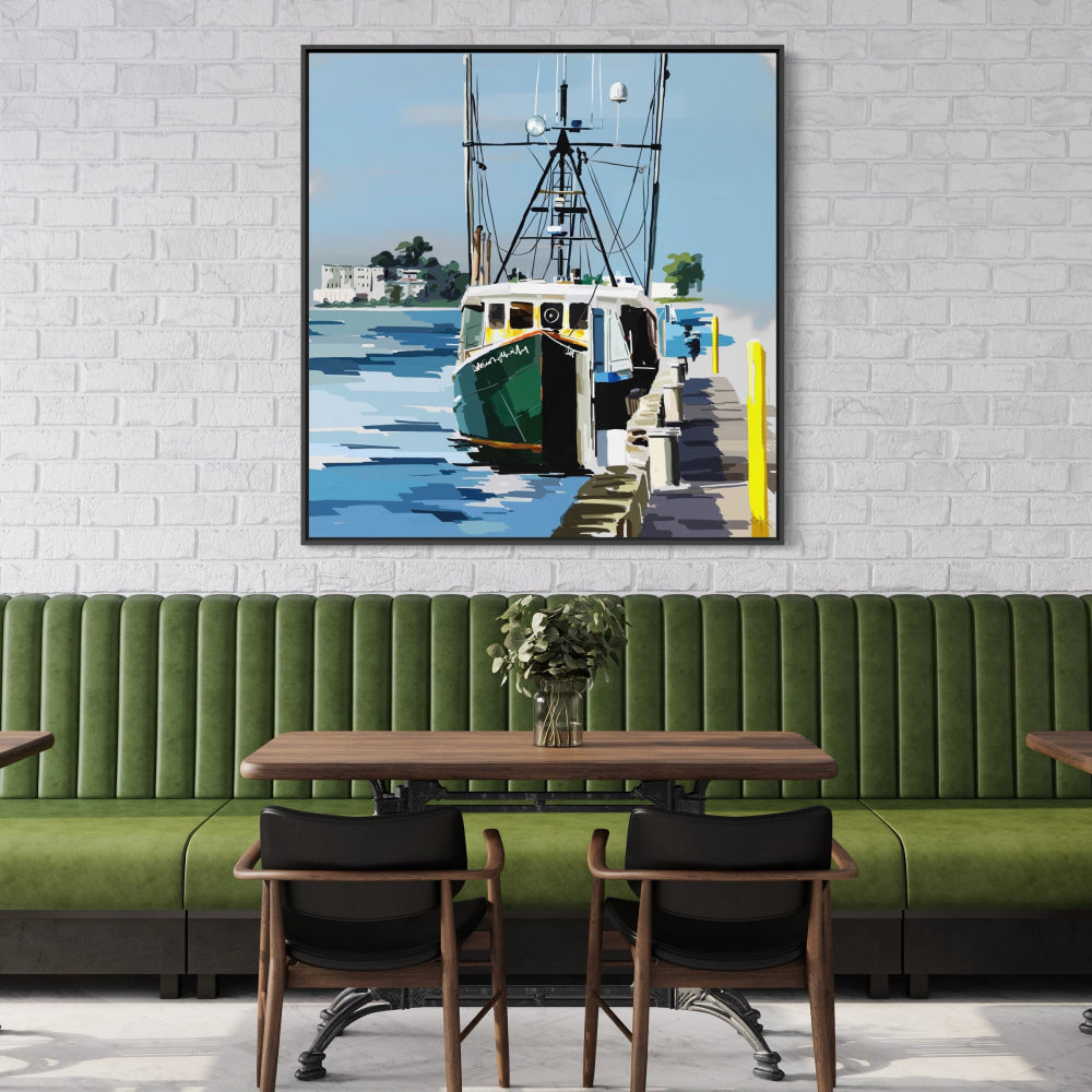 Dining area with a large framed picture of a boat on the wall.