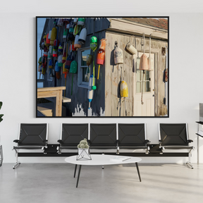 Modern office waiting area with a large wall art piece depicting colorful buoys.