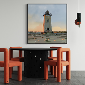 Modern dining area with orange chairs and a black table, featuring a lighthouse painting on the wall.
