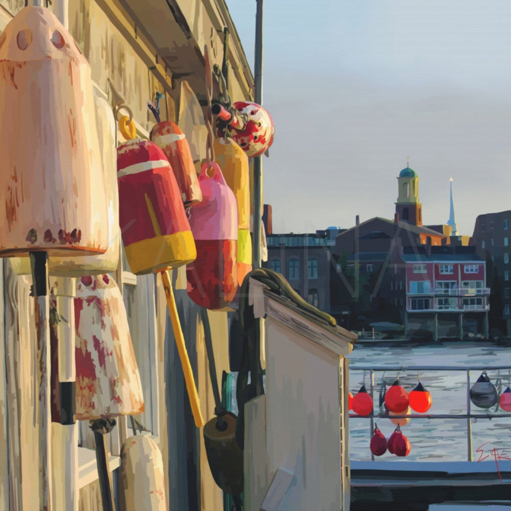 Colorful buoys hanging on a wall with a cityscape in the background