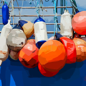 Colorful buoys hanging on a boat against a blue sky.
