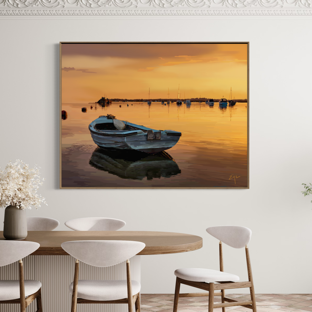 Dining room with a large wall art of a boat on water at sunset.