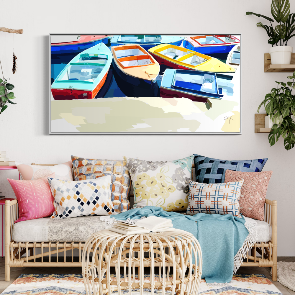 Living room with a sofa, coffee table, and wall-mounted TV displaying colorful boats.