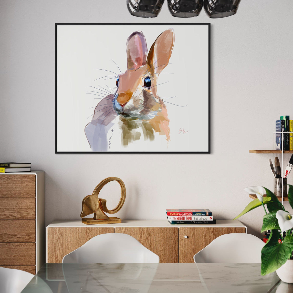 Dining room with a framed artwork of a rabbit on the wall