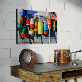 Colorful buoy painting on a wall above a wooden console table with decorative items.