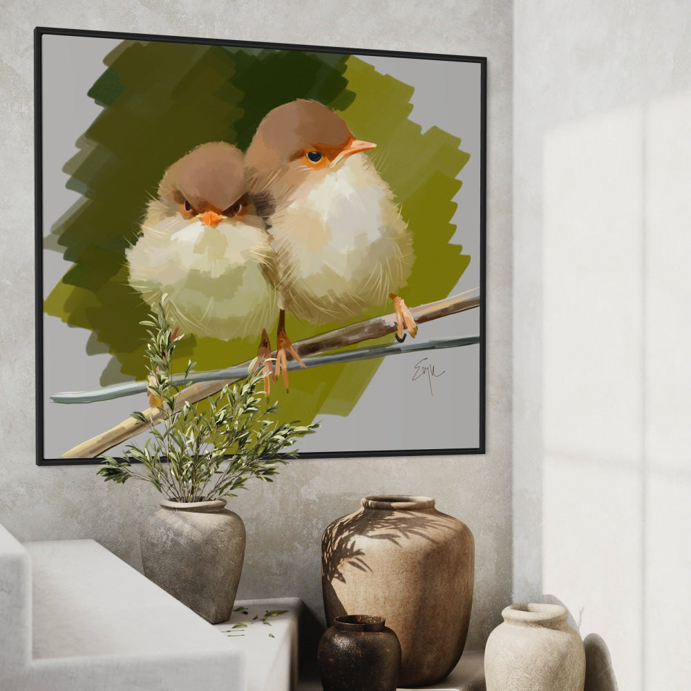 Framed artwork of two birds on a branch above decorative vases and plants.