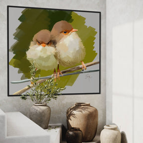 Framed artwork of two birds on a branch above decorative vases and plants.