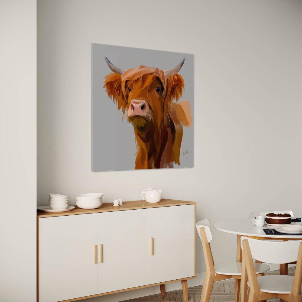 Dining room with a highland cow painting on the wall.