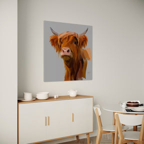 Dining room with a highland cow painting on the wall.